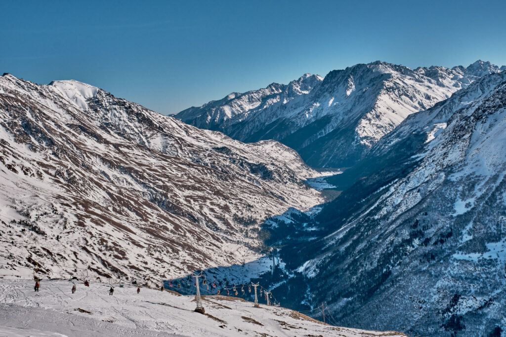 Winter mountain landscape of the Elbrus region. Baksan Gorge, Kabardino-Balkaria, Russia. Chair lift on Mount Cheget.