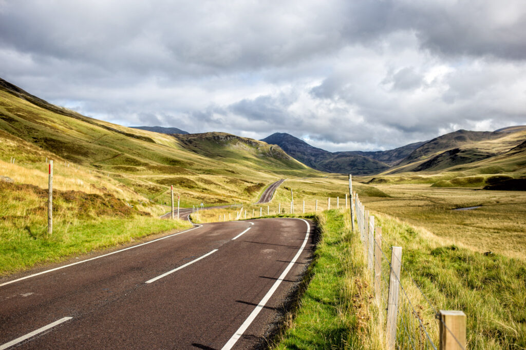 Road in Scotland, hills and clouds