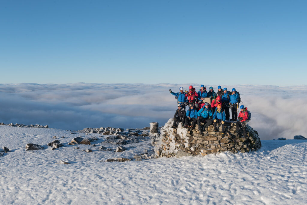 UK, Scotland, Ben Nevis, mountaineers on summit